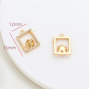 Detail of 15mm x 12mm gold rose pendant with zircon inlay showing front and back views