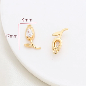 Detailed close-up of gold-plated tulip pendant with zirconia stone, size 9mm by 17mm