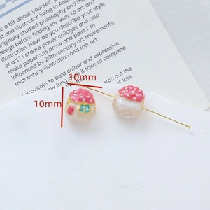Dettaglio perla a forma di fungo da 10mm con tetto rosa e smalto perlato per gioielli DIY