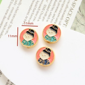 Detailed macro view of 11mm vintage Tang style enamel beads for DIY jewelry making