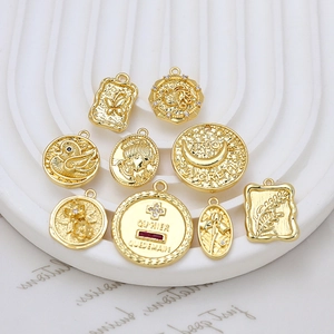 Vintage gold plated copper pendants with embossed patterns and zircon inlays for DIY jewelry