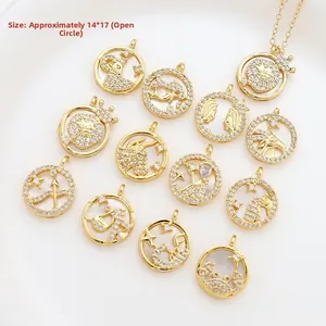 Macro detail of gold-plated zodiac charms with pavé crystals and open jump ring