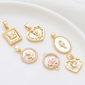 Gold-plated butterfly and heart shell pendants with cubic zirconia for DIY jewelry making