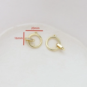 Macro view of gold-plated jewelry connector with cubic zirconia, size 20mm x 16mm