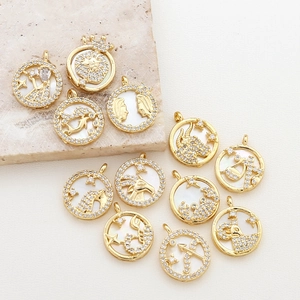 Gold plated zodiac pendants with white mother of pearl and cubic zirconia settings