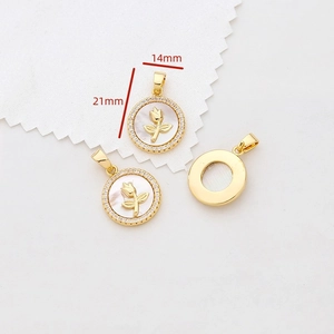 Detail of 14mm 18K gold plated mother of pearl rose pendant with cubic zirconia trim