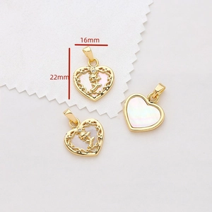 Detail view of heart-shaped gold rose pendant with dimensions of 16mm by 22mm