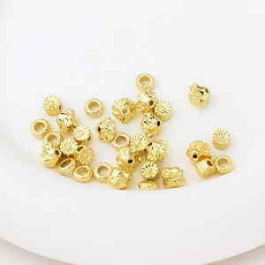 Gold plated flower-shaped spacers and irregular metal beads for DIY jewelry making
