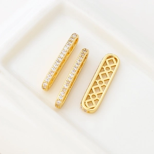 Detailed macro view of 18k gold plated rectangular spacer with cubic zirconia for DIY jewelry