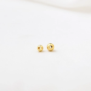Polierte 14K Gold-Zwischenperlen mit Durchgangsloch für DIY-Schmuckherstellung