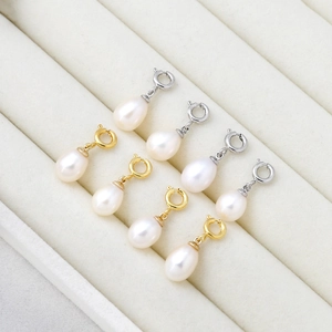 Teardrop freshwater pearl pendants with spring ring clasps in gold and silver finishes