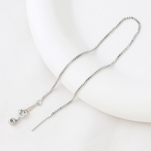 Detail of adjustable silver box chain with needle end for DIY jewelry making