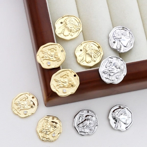 Vintage double-sided Athena and owl coin pendants in gold and silver with zircon