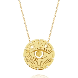 Macro detail van de 18K gouden tarot hanger met hol oogontwerp en sterrenpatronen