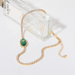 18K gold plated evil eye tennis bracelet with zircon stones and green malachite center