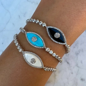 Three Evil Eye bracelets in 18K gold plating with turquoise and zircon stones