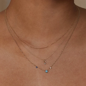 Three-layer gold plated necklace with blue opal drop pendants and twisted link chains
