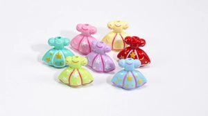 Detailed macro view of colorful acrylic princess dress beads with star moon patterns