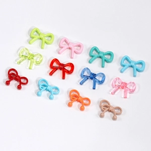 Colorful mix of transparent and solid bow-shaped beads for DIY jewelry and accessory making