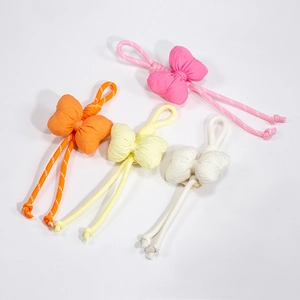 Set of four colorful 3D bow bag charms and phone lanyards in vibrant checkered fabric