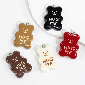 Set of five colorful resin bear pendants with Hug Me text and silver metal rings