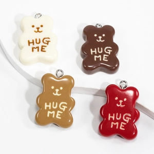 Colorful resin bear pendants with Hug Me text for DIY keychains and jewelry making