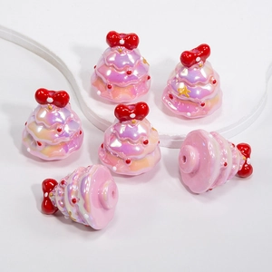 Pink resin Christmas tree DIY beads with red bow and iridescent pearl finish decor
