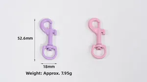 Detail of pink and purple 52.6mm swivel snap hooks with matte painted alloy finish