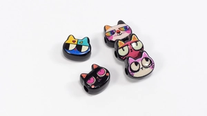 Detailed view of cat-shaped acrylic beads with vibrant cartoon faces for DIY jewelry making