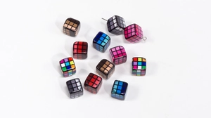 Macro view of checkered acrylic cube beads for DIY jewelry and keychain accessories