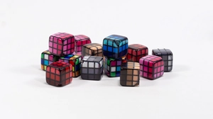 Macro view of colorful grid cube acrylic beads with pre-drilled holes for DIY jewelry