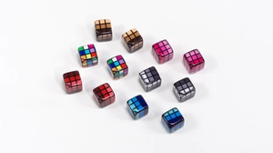 Detailed view of colorful acrylic cubic beads with grid patterns for DIY jewelry making