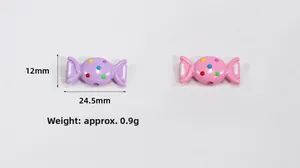 Detail view of 24.5mm candy shaped acrylic beads with colorful polka dots for DIY jewelry