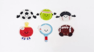 Detail view of six cute acrylic sports keychains with glitter finish and smiley faces