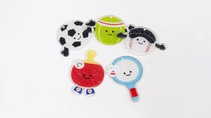 Detail of acrylic cartoon sports pendants with glitter filling and cute emoji faces
