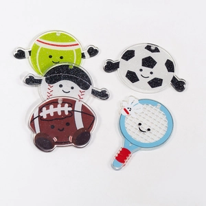 Five cute acrylic cartoon sports ball keychains including soccer and tennis with glitters