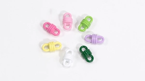 Macro detail of colorful screw barrel clasps for DIY jewelry making and bracelets