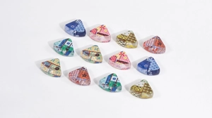 Mix of colorful acrylic triangle beads with floral and polka dot patterns for DIY jewelry
