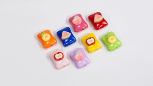 Macro detail of acrylic fruit candy charms for DIY phone cases and jewelry making