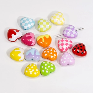 Colorful acrylic heart beads with checkerboard and polka dot patterns for DIY jewelry making