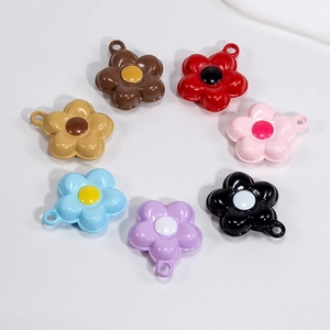 Set of seven colorful flower charms in various glossy finishes for DIY keychains