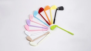 Detailed overhead view of 12 colorful alloy golf club charms for DIY accessory sets