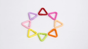 Macro display of triangular alloy carabiner hooks in 8 vibrant painted colors for DIY crafts