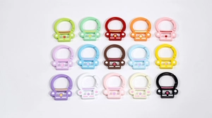 Detailed grid showing colorful robot-shaped spring ring buckles for DIY keychains