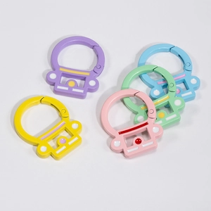 Candy-colored car-shaped metal carabiners with spring-ring keychain clips in five vibrant hues