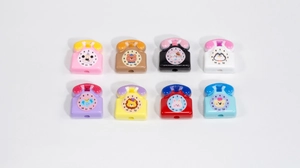Macro shot of colorful retro phone acrylic beads for DIY jewelry making and phone chains