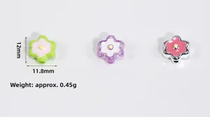 Macro shot of 12mm acrylic flower beads for DIY crafts showing dimensions and weight