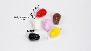 Macro shot showing 20mm acrylic skull beads in multiple colors with 1.95g weight detail