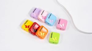 Close-up of colorful acrylic Joker rectangular beads for DIY jewelry and phone chains