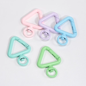 Five macaron colors of triangular alloy spring buckles with swivel rings on light background